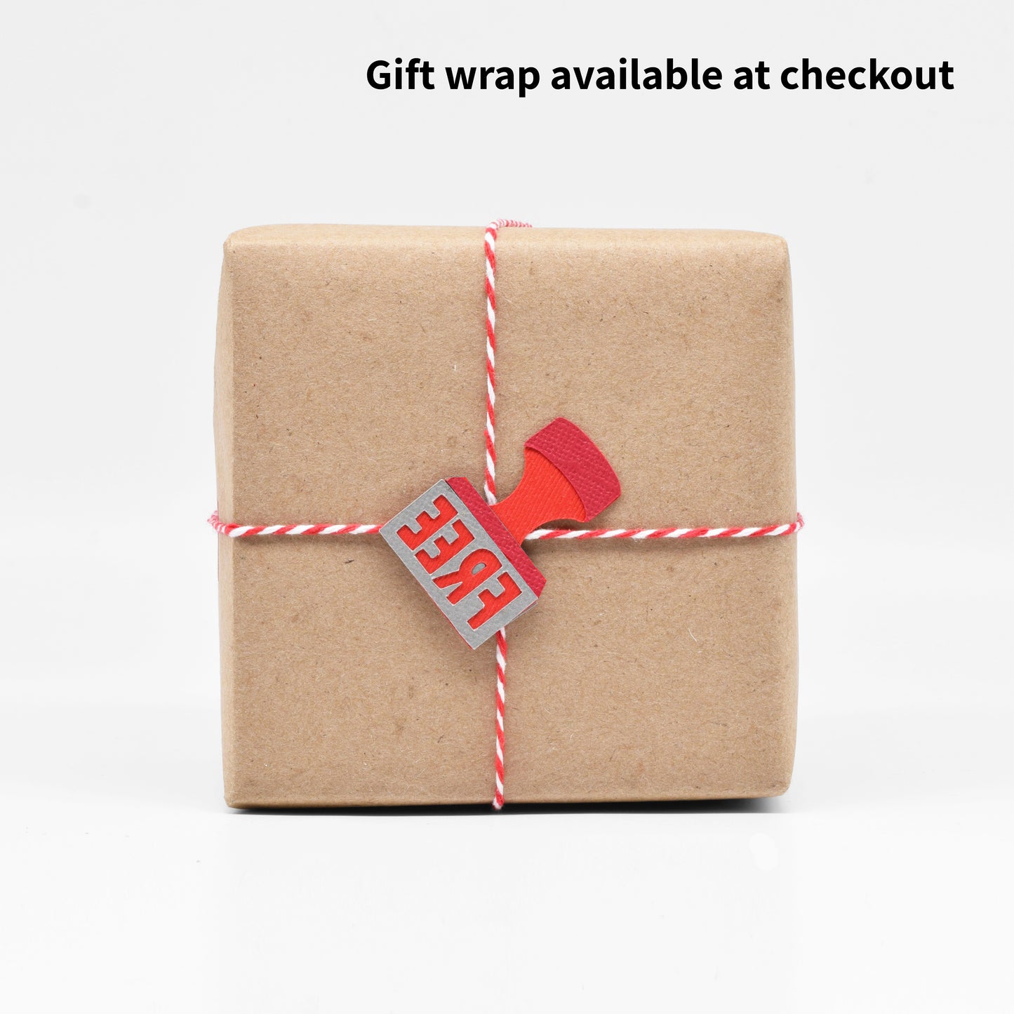 The gift wrap features the "Free" stamp sculpture in Cleveland, Ohio.