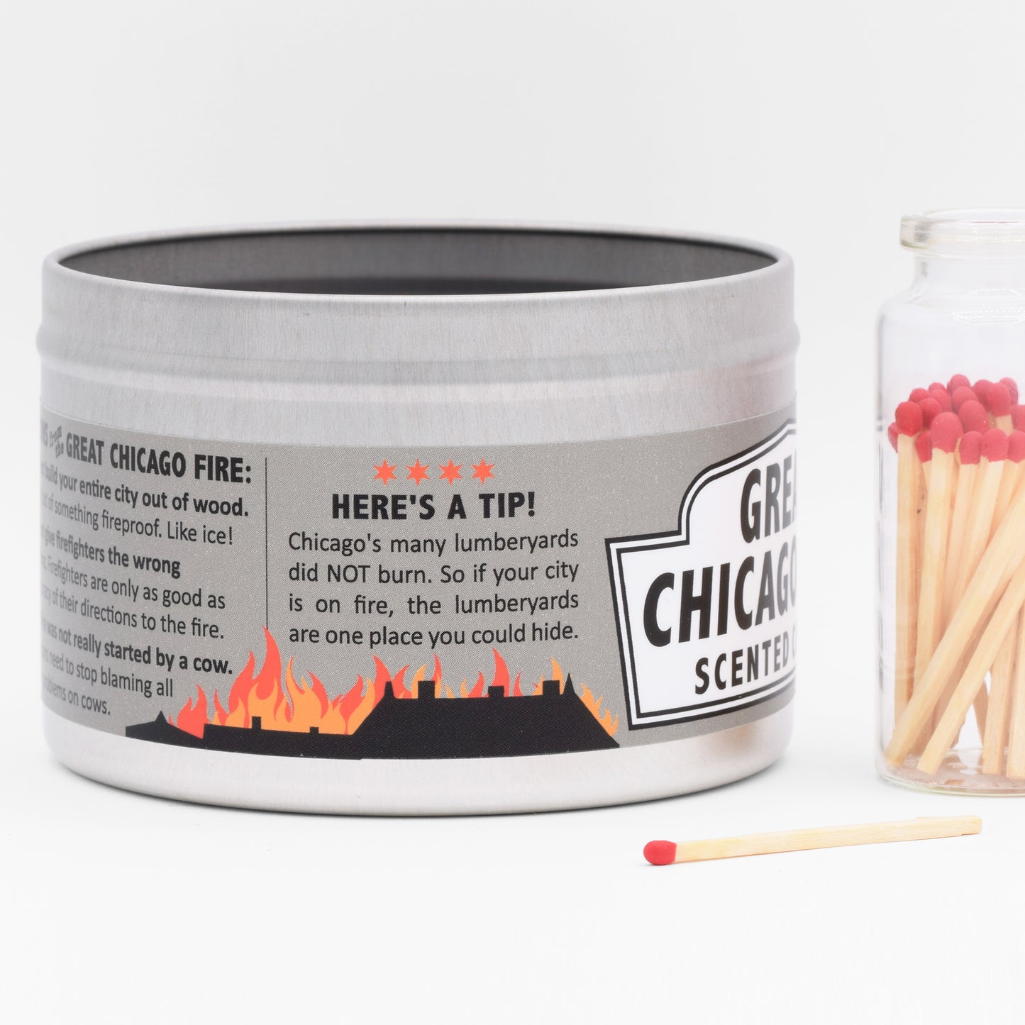 The candle has a humorous label making it a funny and unique gift, especially for someone from Chicago or interested in Chicago history.