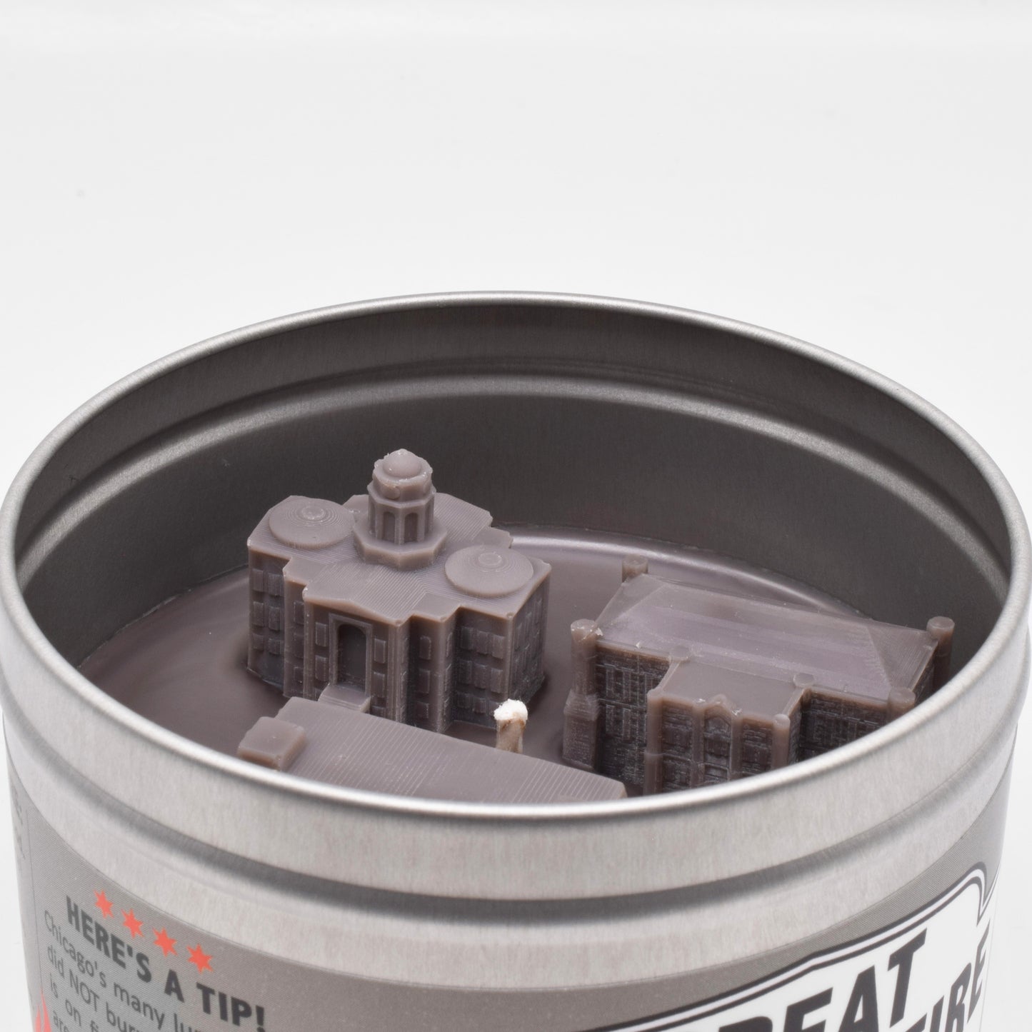 The surface of the candle is gray, to represent how everything was charred and covered in smoke and ash after the fire.