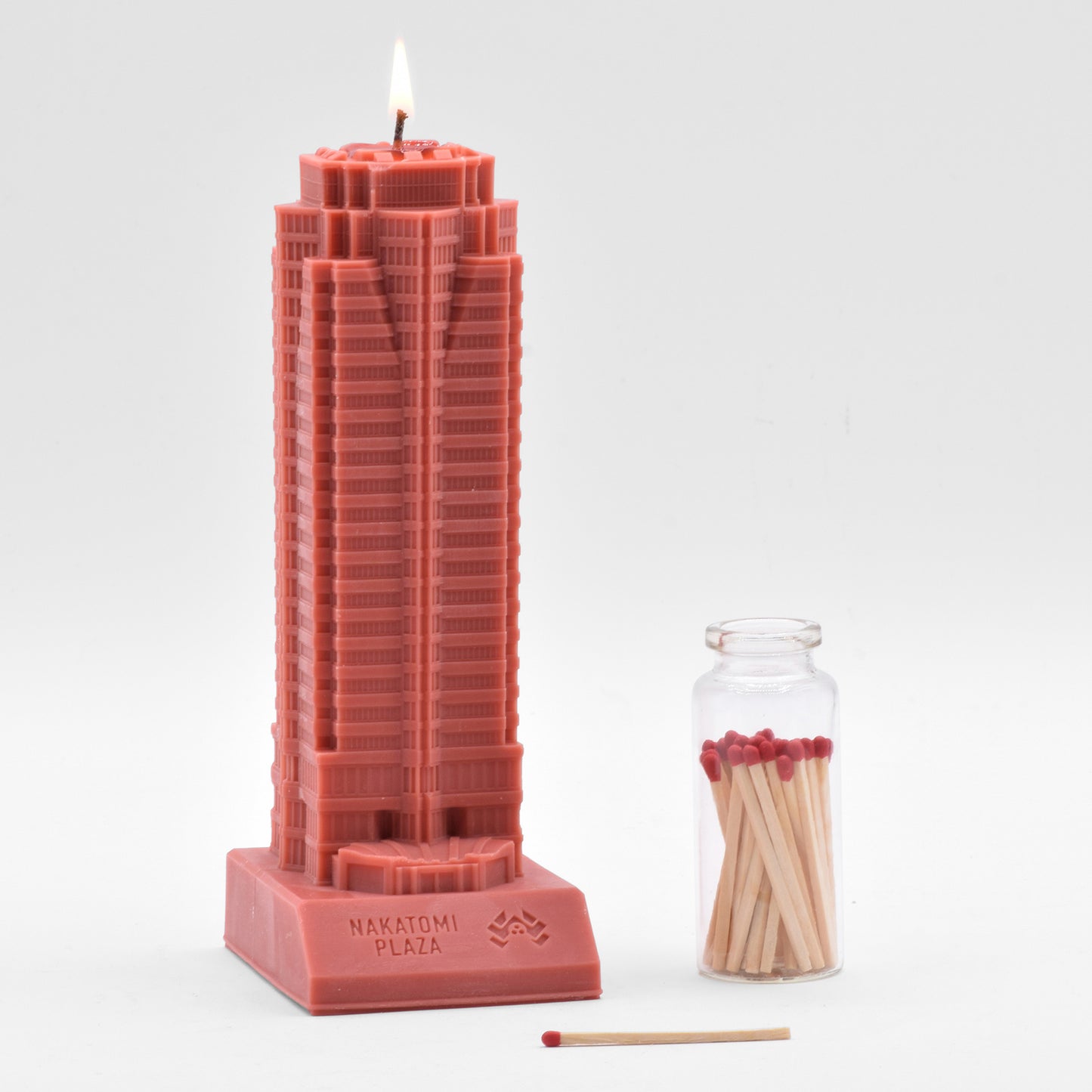 The Nakatomi Plaza Scented Candle smells like pine (which makes it especially useful if you have an artificial Christmas tree.)