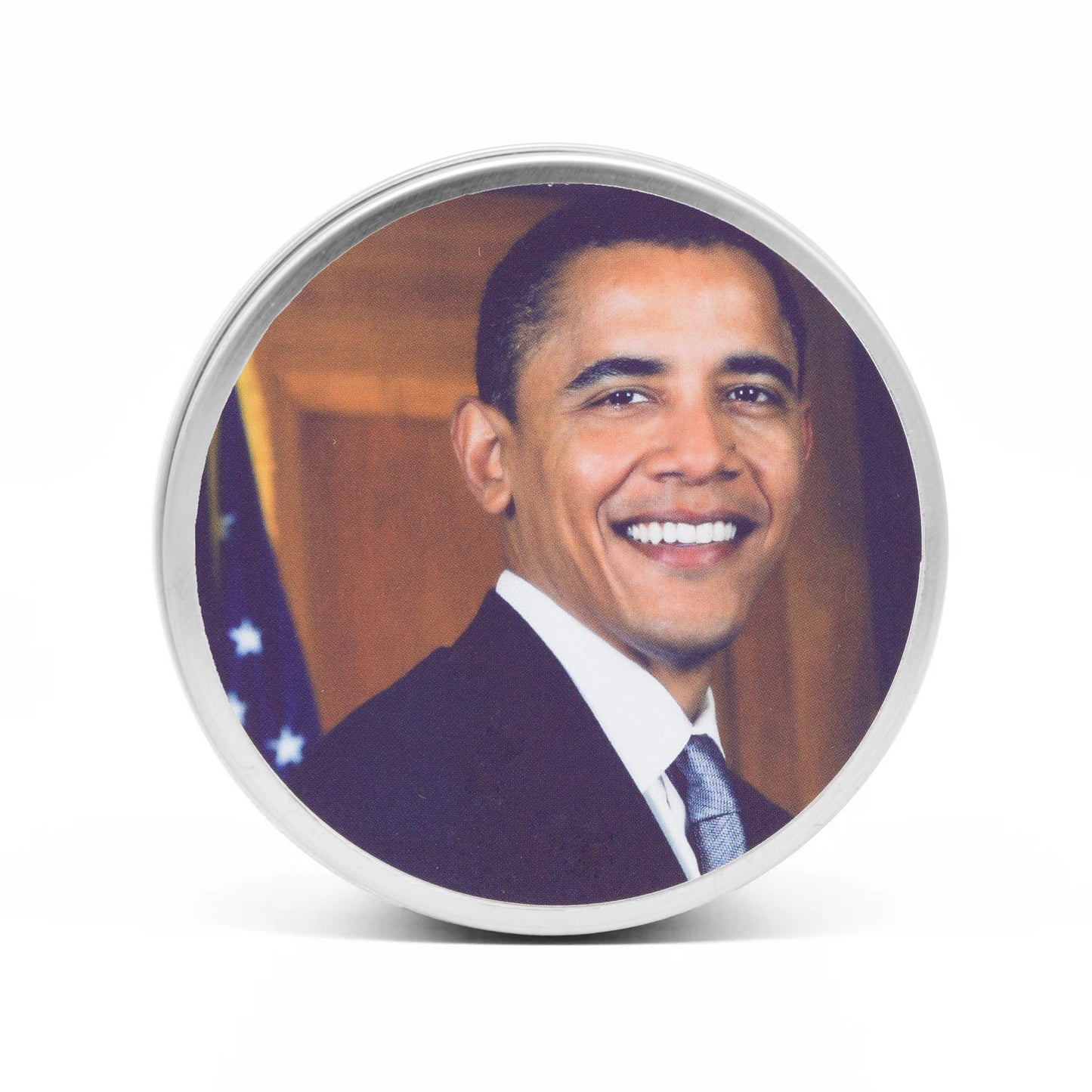 The candle lid features a handsome photo of Barack Obama for you to admire.