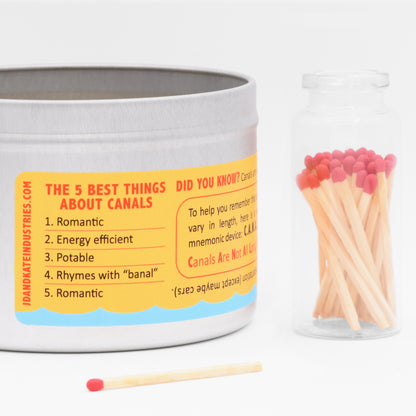 It is a humorous candle with a funny label that includes a list of the top 5 best things about canals. 