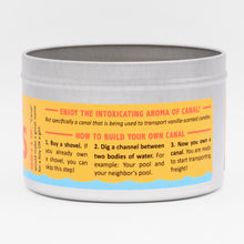 Load image into Gallery viewer, This weird candle has a brightly colored label and comes with humorous instructions for how to build your own canal. 