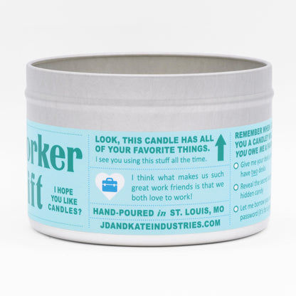 This candle has wax embeds of all of your coworker's favorite things on it, to remind them of work.