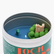 Load image into Gallery viewer, The Loch Ness Monster Scented Candle is a perfect souvenir for someone who has visited or dreams of visiting Loch Ness, or a gift for anyone interested in Scottish heritage.