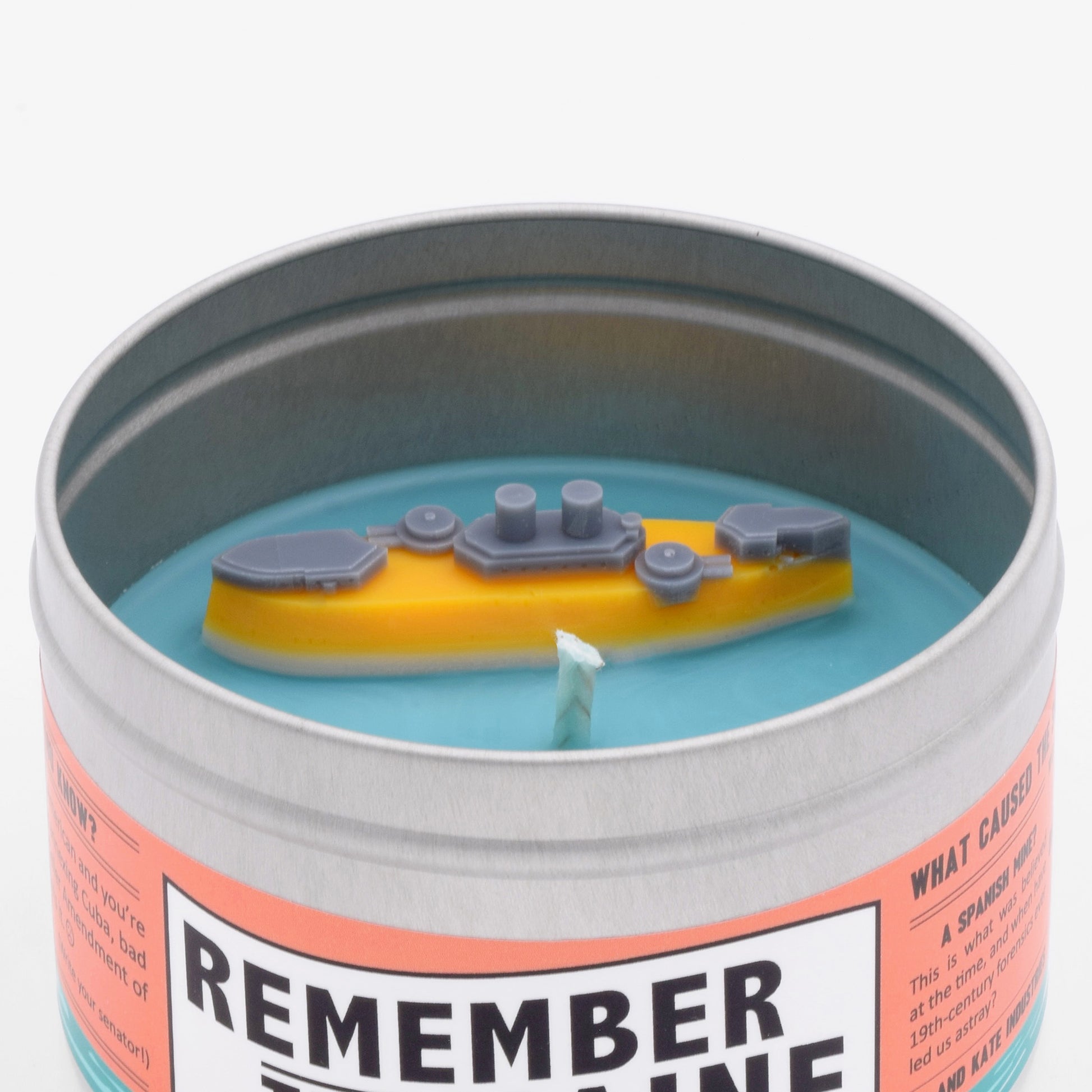 The surface of the candle has a miniature wax battleship on its surface, modeled to look just like the USS Maine. 