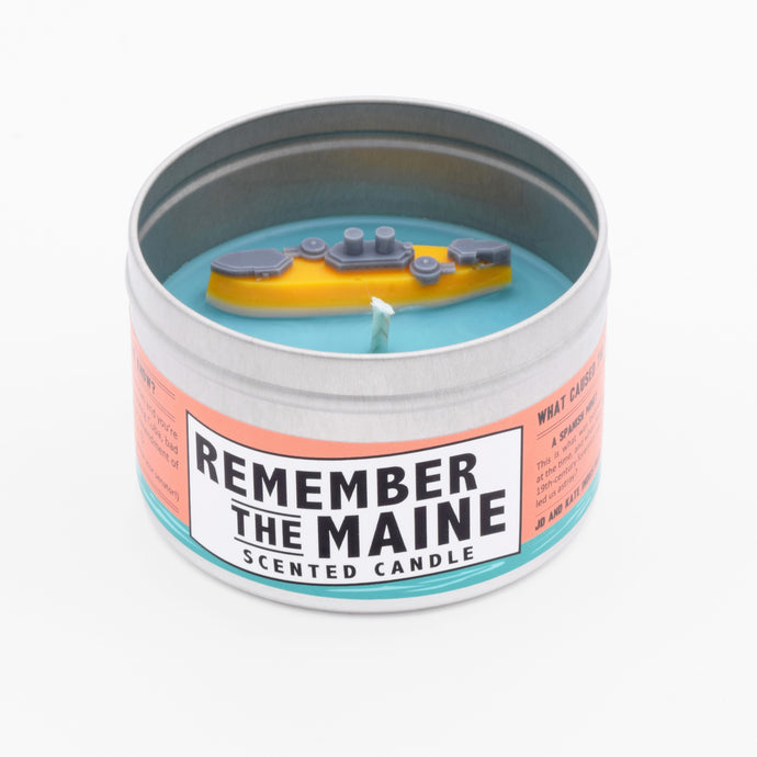 The Remember the Maine Scented Candle smells like mojitos and has a miniature wax model of the USS Maine on its surface.