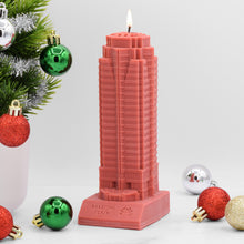 Load image into Gallery viewer, The Nakatomi Plaza Scented Candle is designed to look like the office building from the Christmas movie Die Hard.