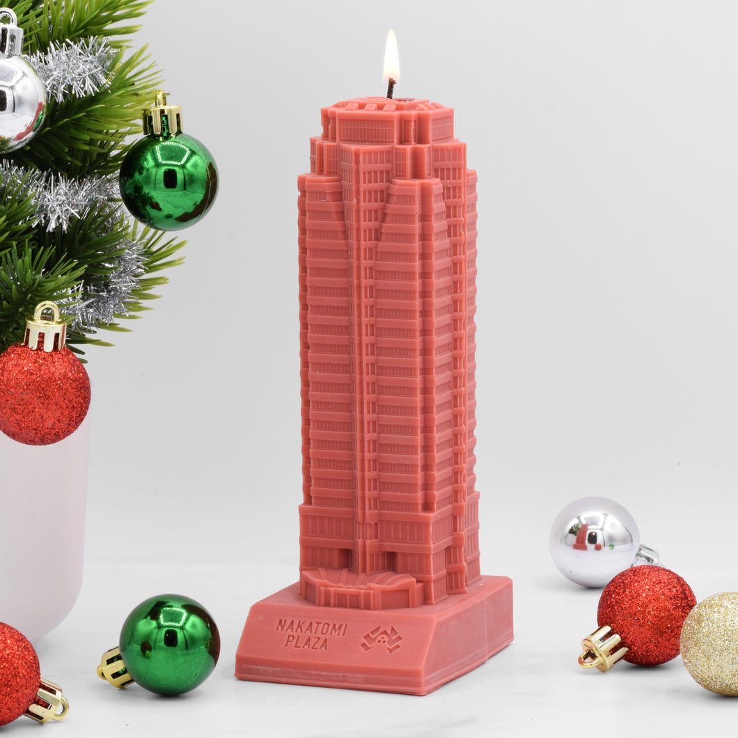 The Nakatomi Plaza Scented Candle is designed to look like the office building from the Christmas movie Die Hard.